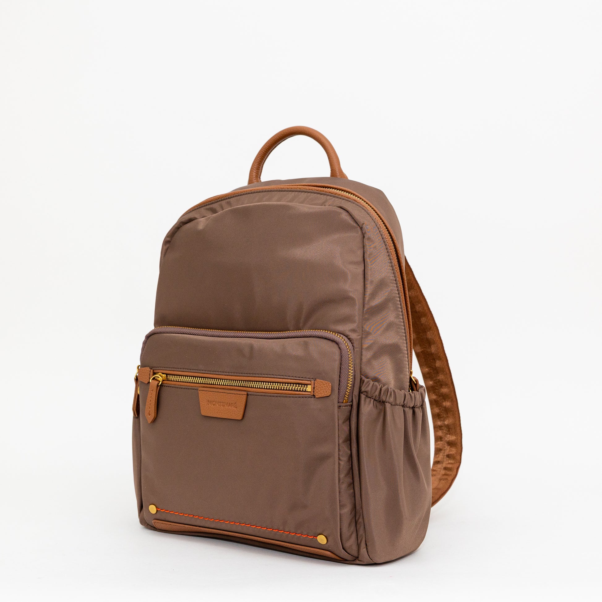 Brown backpack with leather accents on a white background