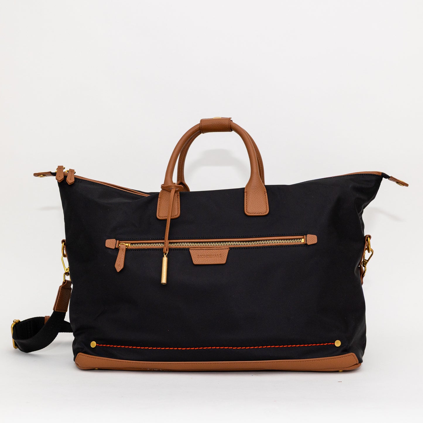 Black carry on bag with brown handles and zippers on a white background