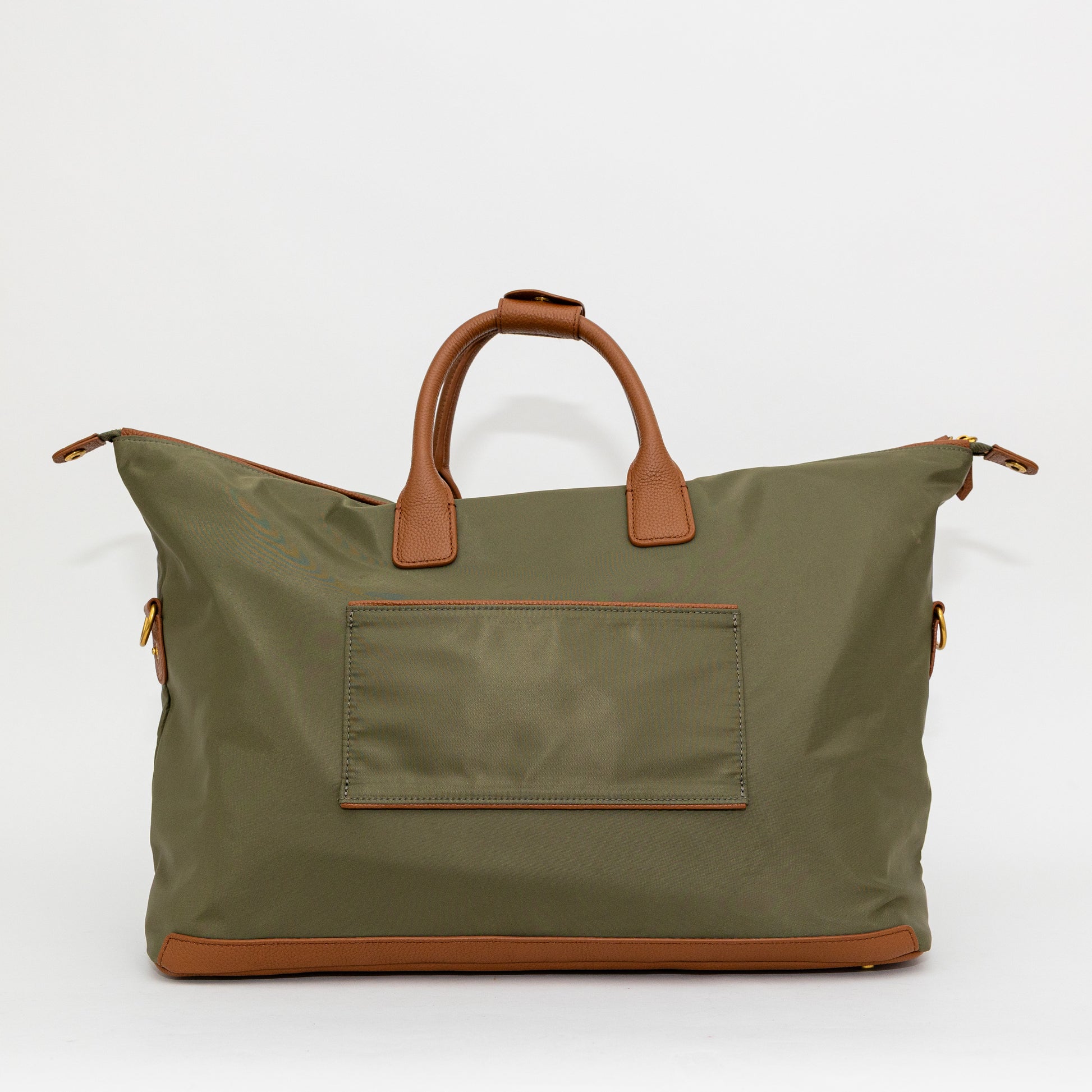 Green carry on bag with brown handles and trim on a white background