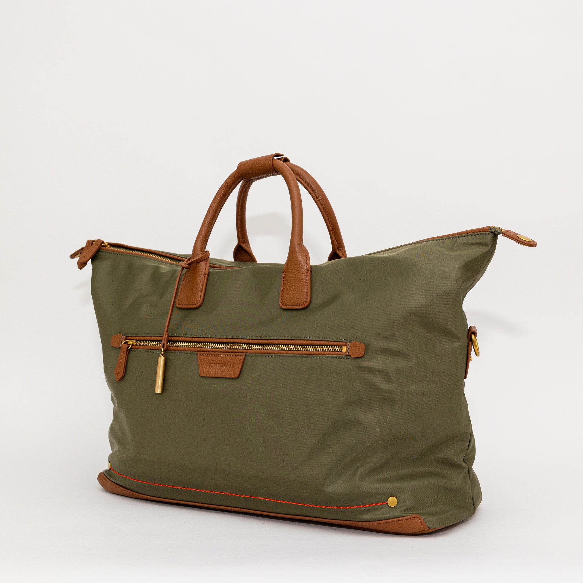 Green carry on bag with brown handles and accents on a white background