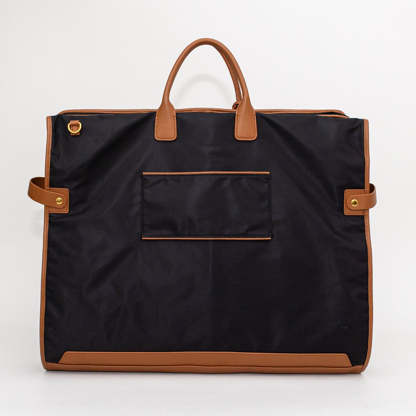 Black garment bag with brown handles and trim on a white background