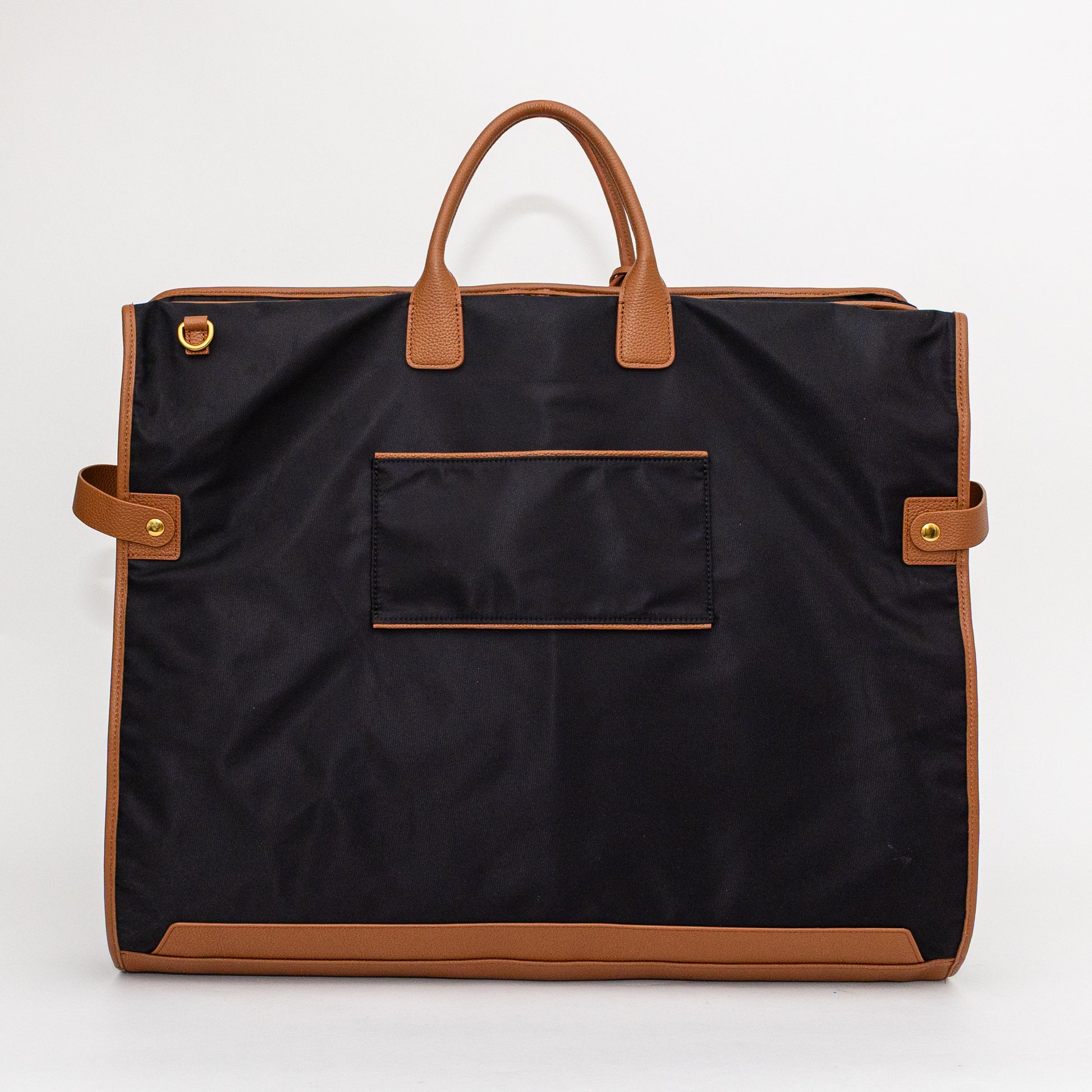 Black garment bag with brown handles and trim on a white background