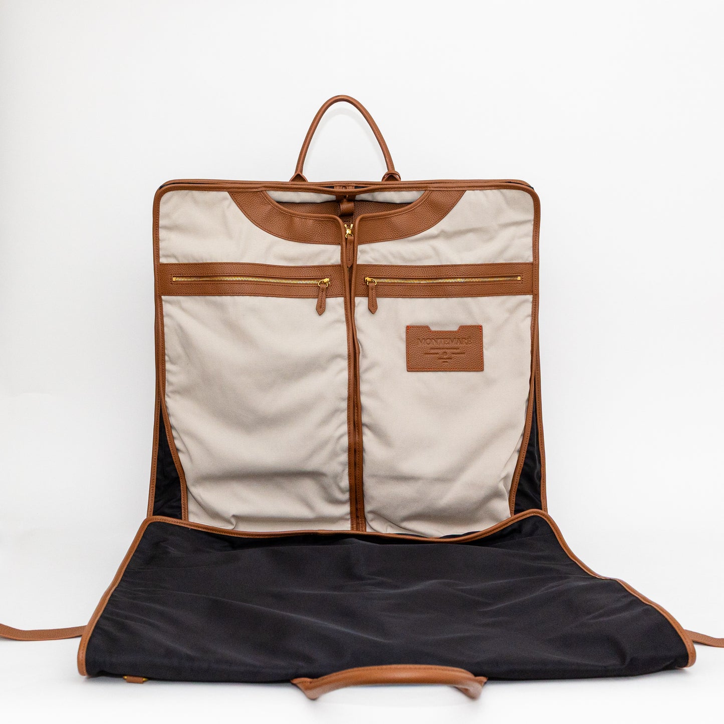 Garment bag with beige interior and black exterior on a white background