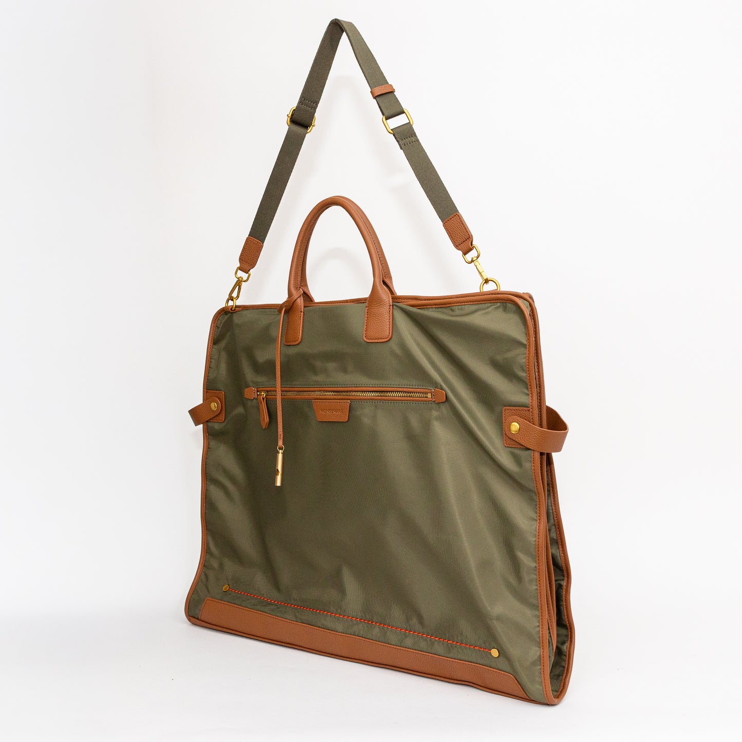 Green and brown garment bag with a shoulder strap on a white background