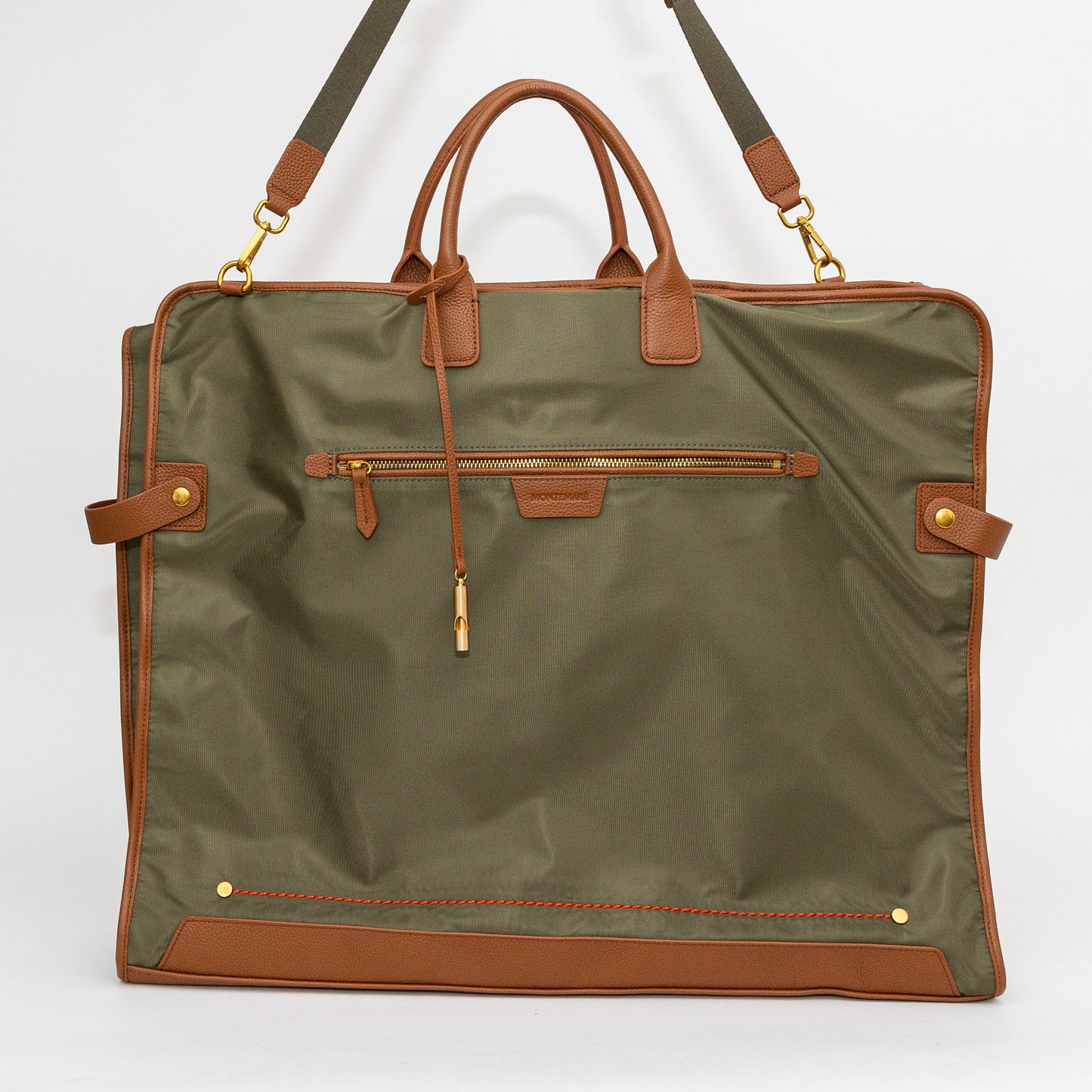 Green garment bag with brown accents on a white background