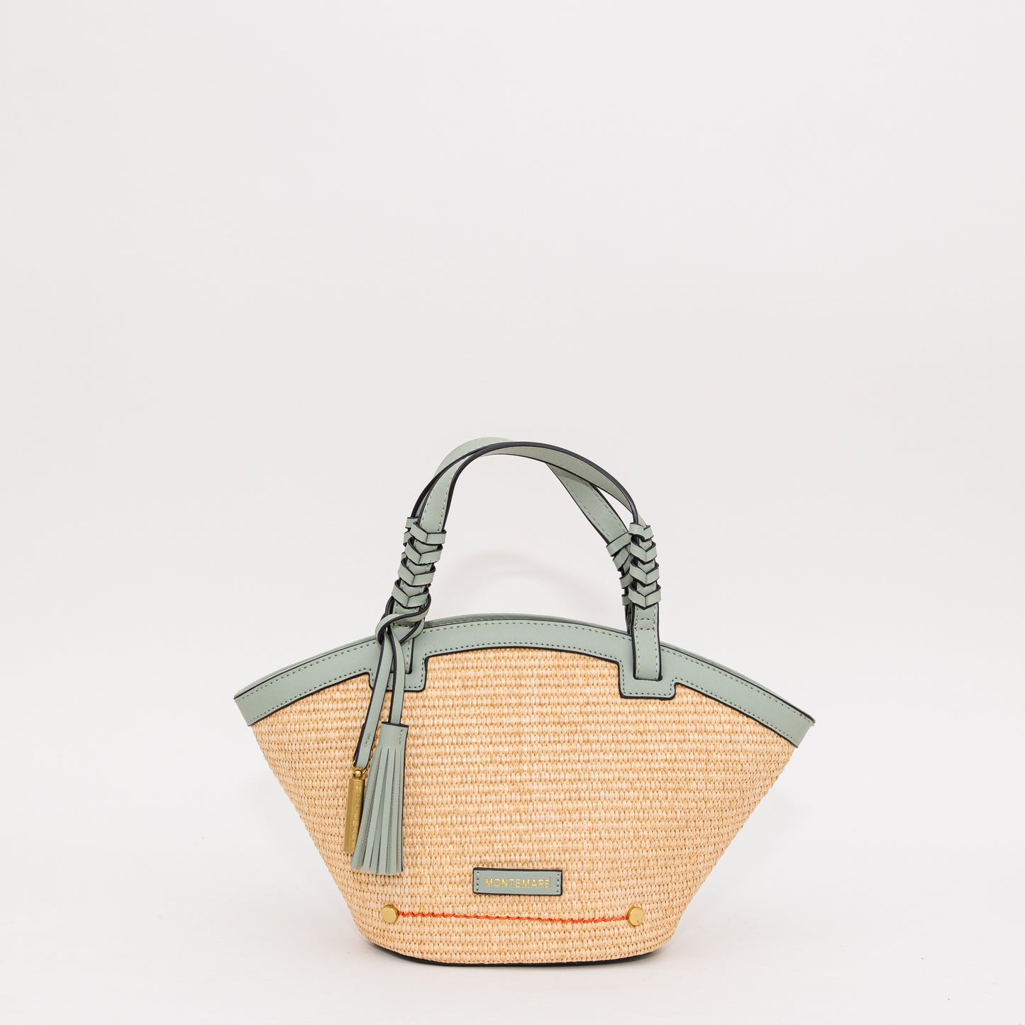 Woven handbag with blue handle and trim on a white background