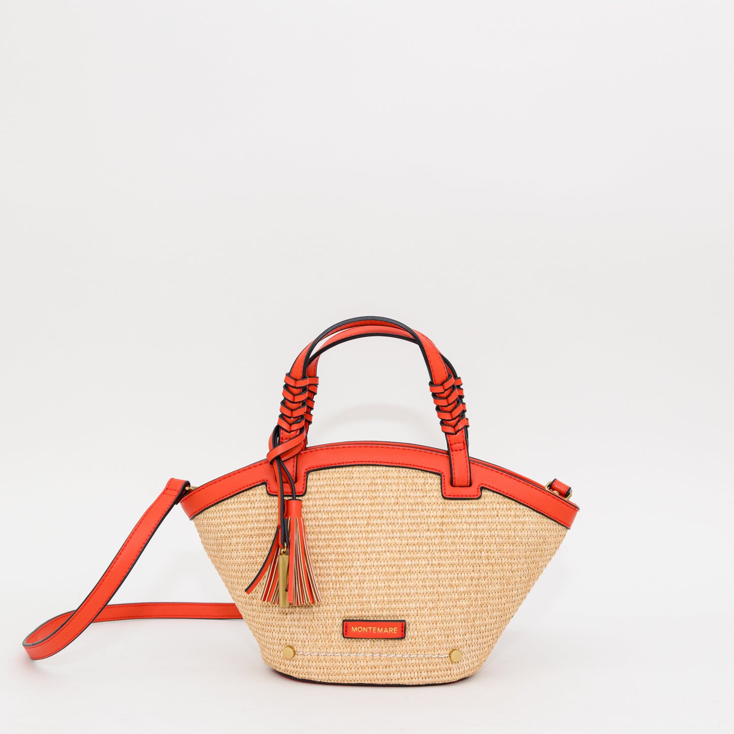 Woven handbag with orange accents on a white background
