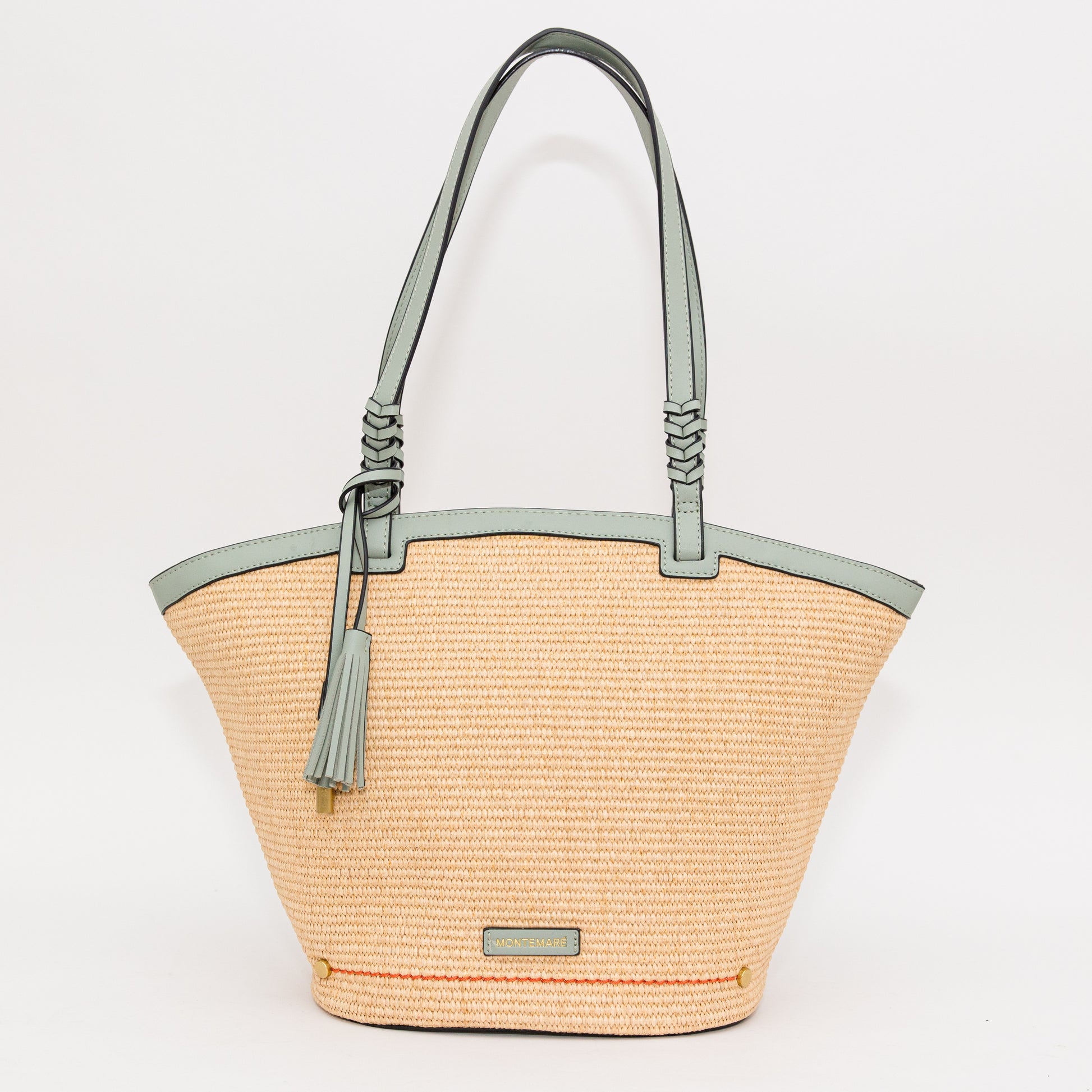 Woven handbag with a blue handle and trim on a white background