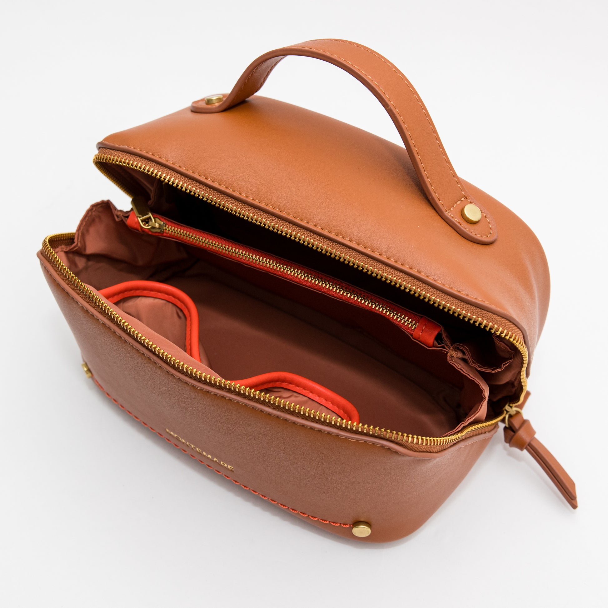 Brown leather handbag with open top on a white background