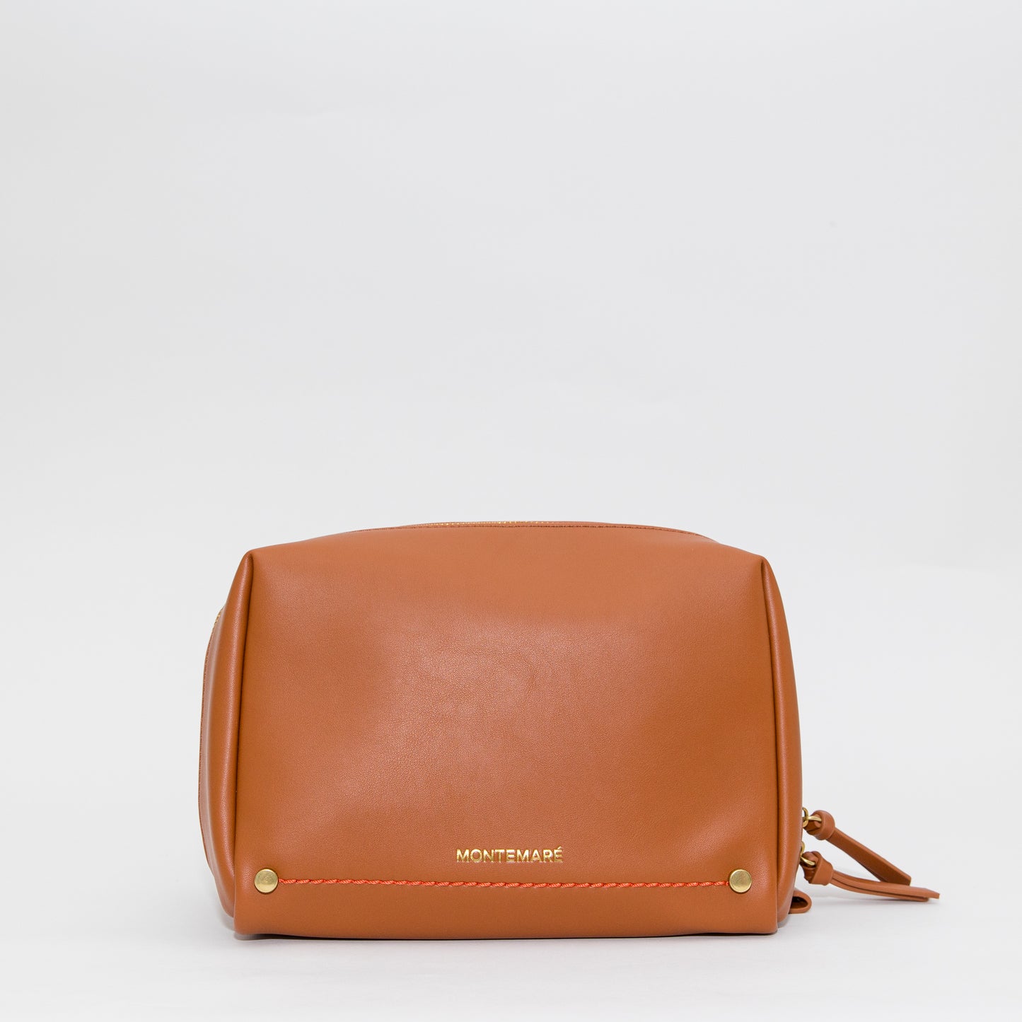 Brown leather bag with gold hardware on a white background