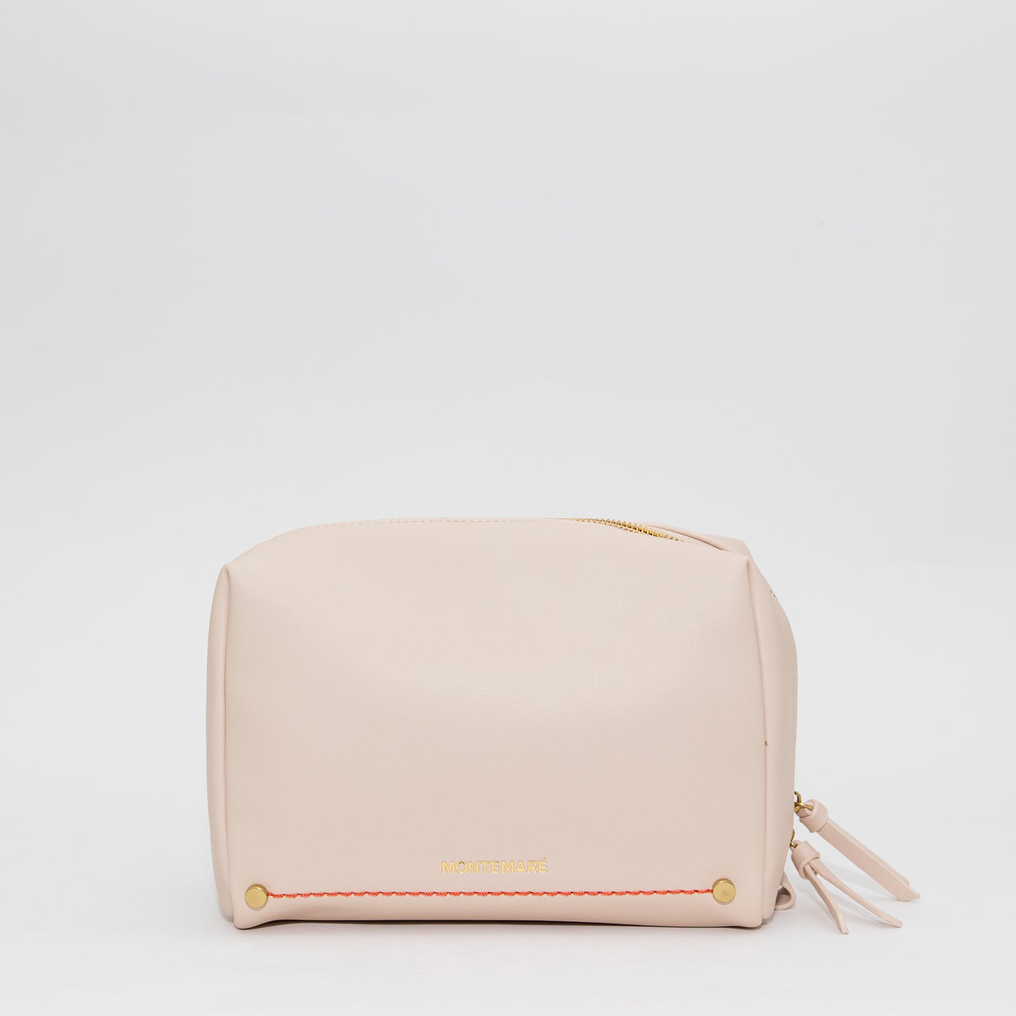Ivory pouch with a zipper on a light gray background