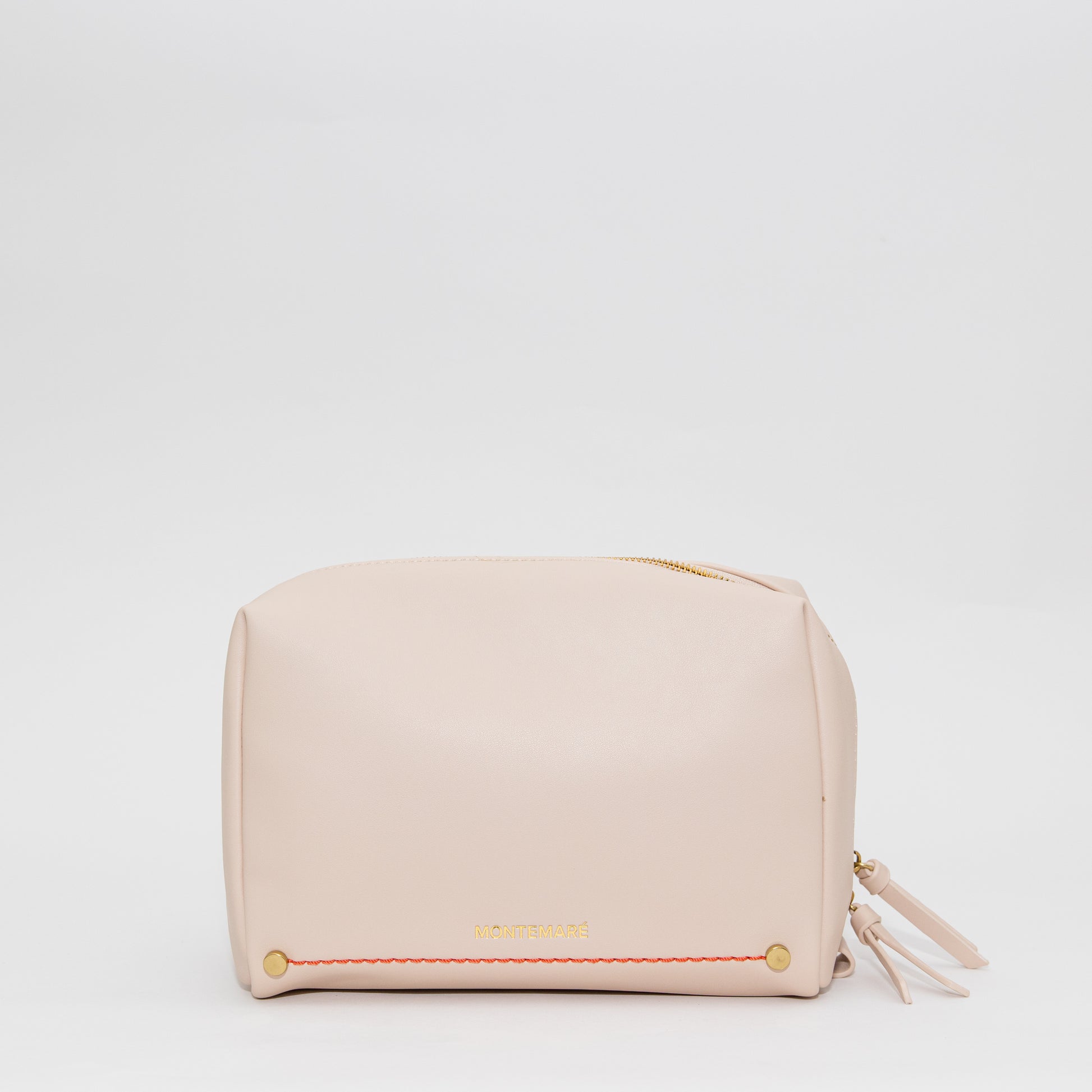 Ivory pouch with a zipper on a light gray background