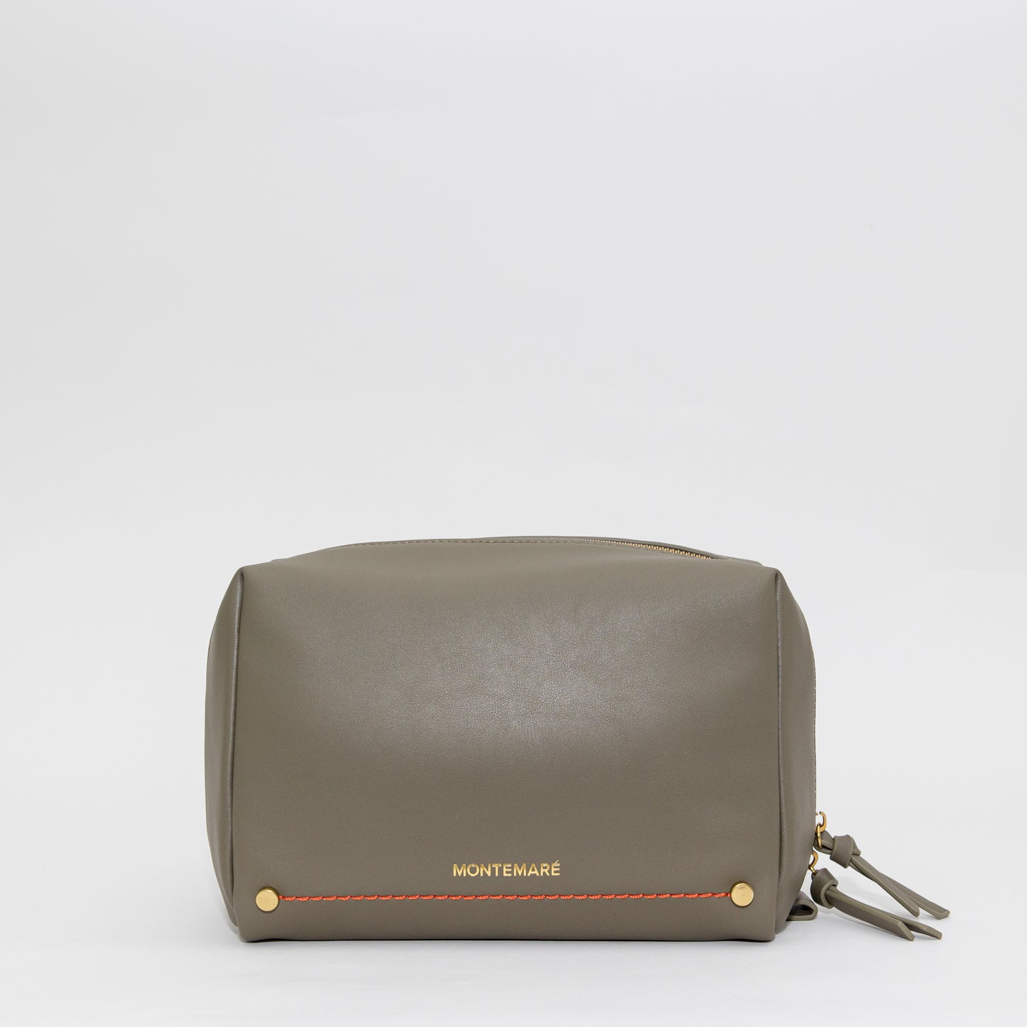 Green leather pouch with 'Montemare' branding on a white background