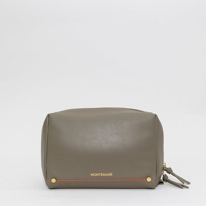 Green leather pouch with 'Montemare' branding on a white background