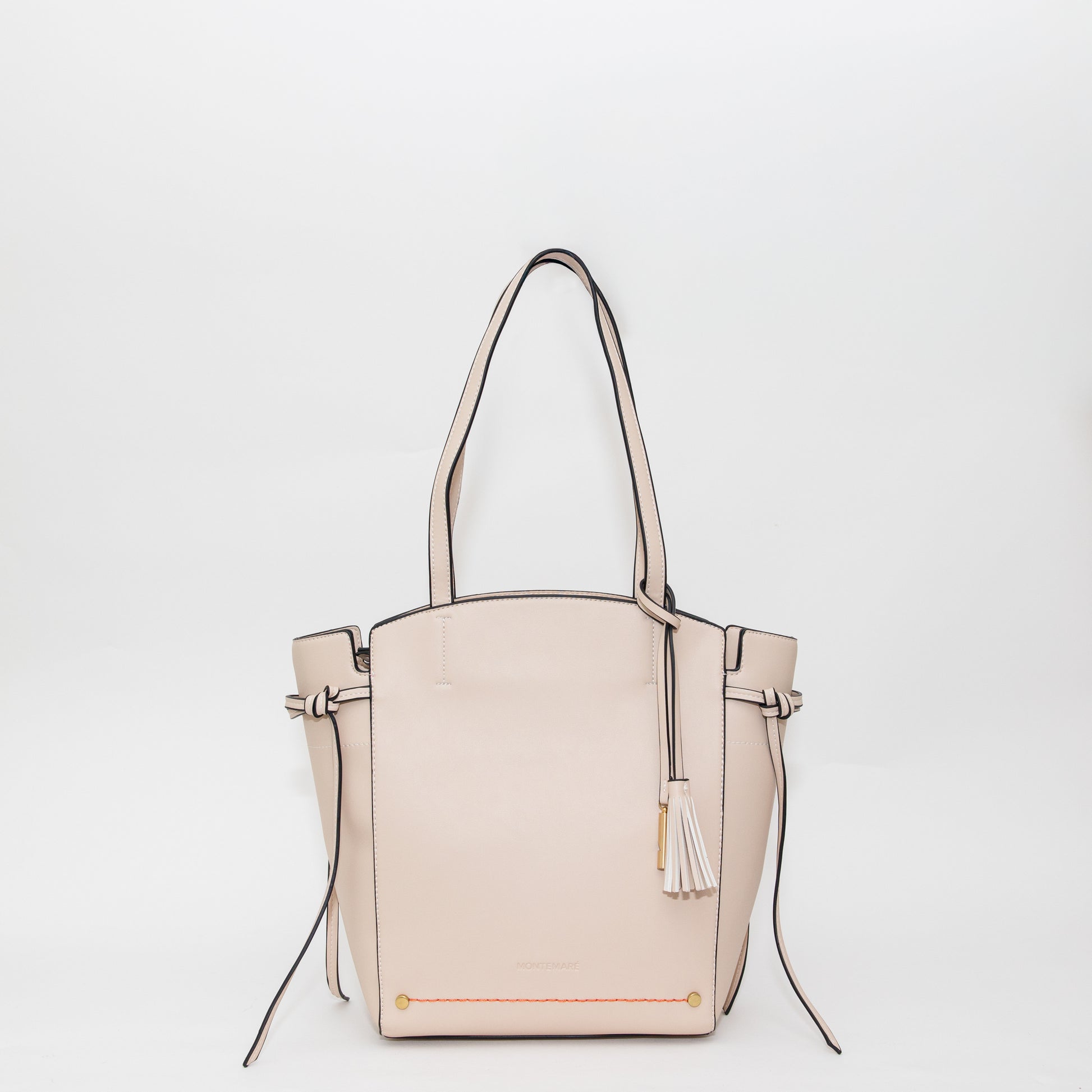 Beige handbag with a tassel on a white background