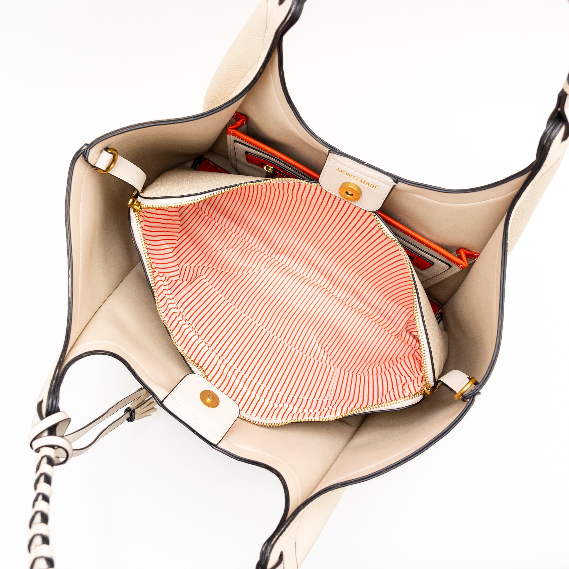 Cream handbag with a striped inner sleeve on a white background