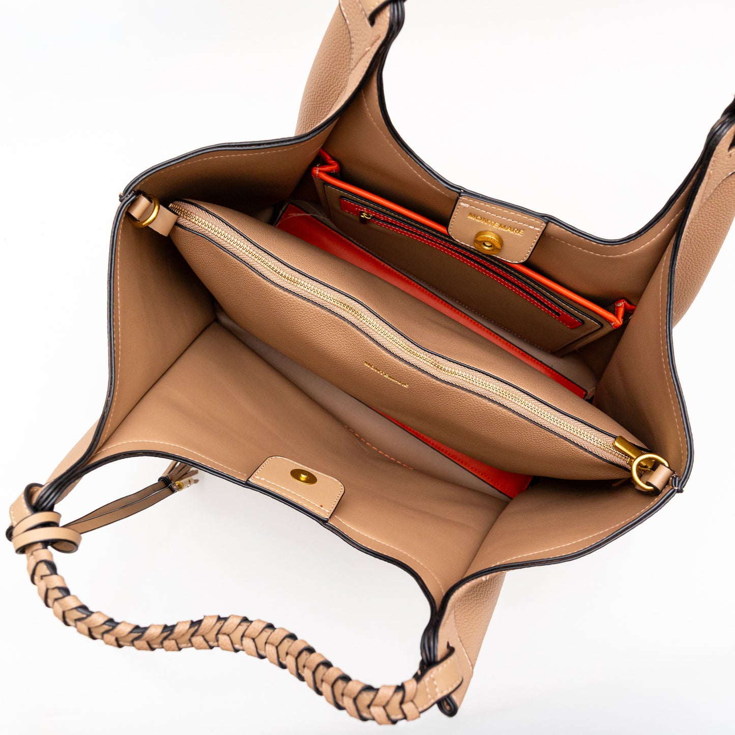 Beige handbag with a red interior on a white background