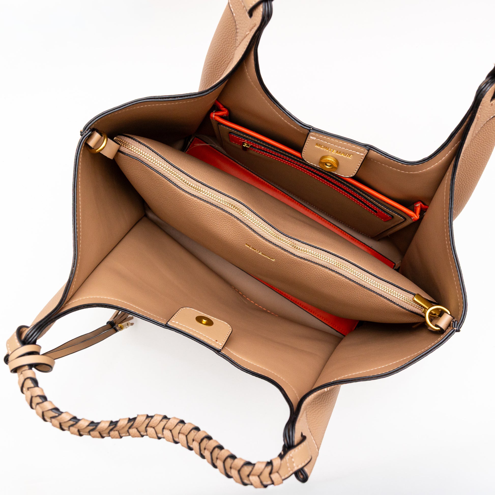 Beige handbag with a red interior on a white background