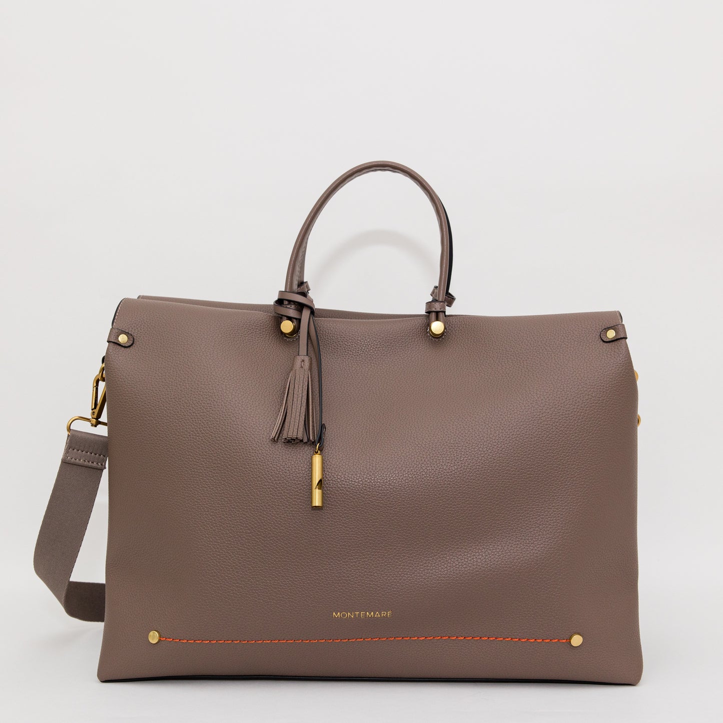 Brown handbag with gold accents on a white background