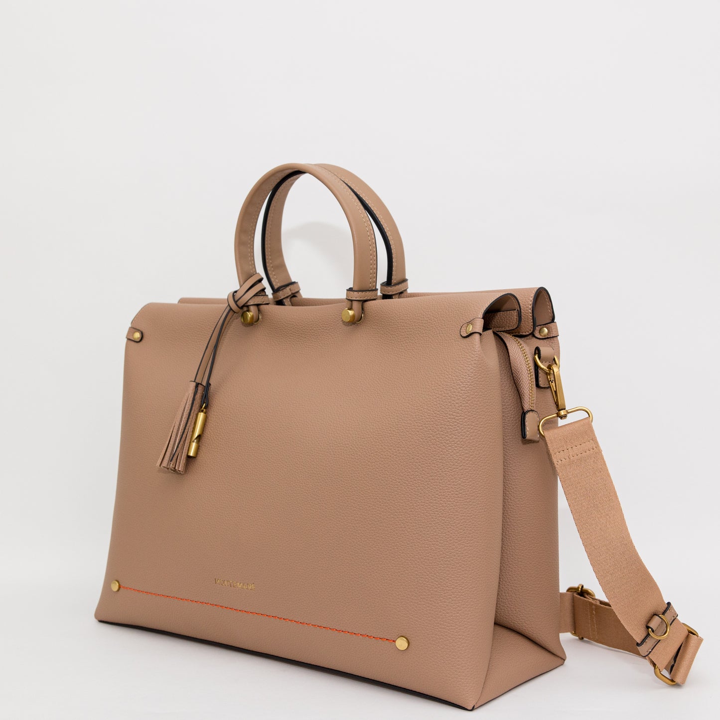 Beige handbag with gold accents on a white background