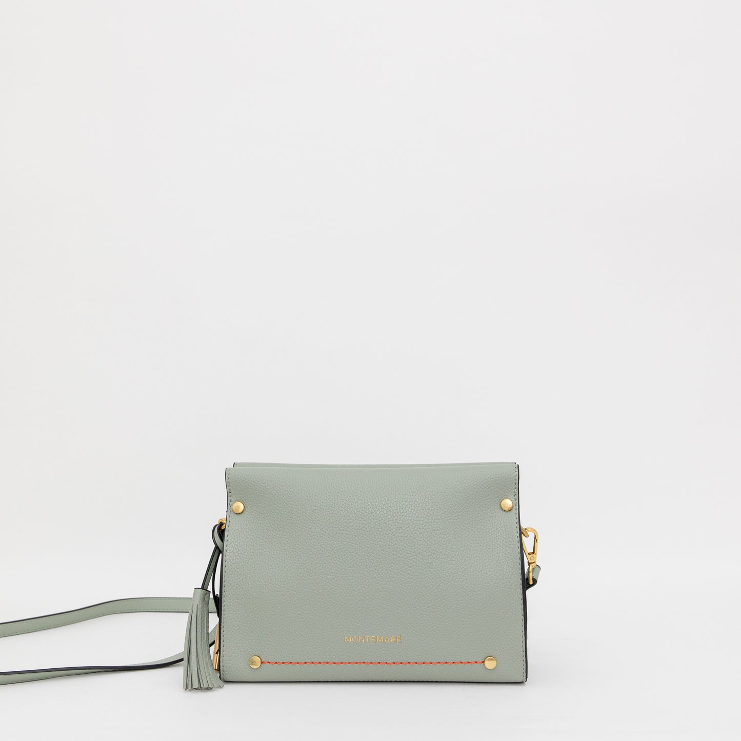Light blue handbag with gold accents on a white background