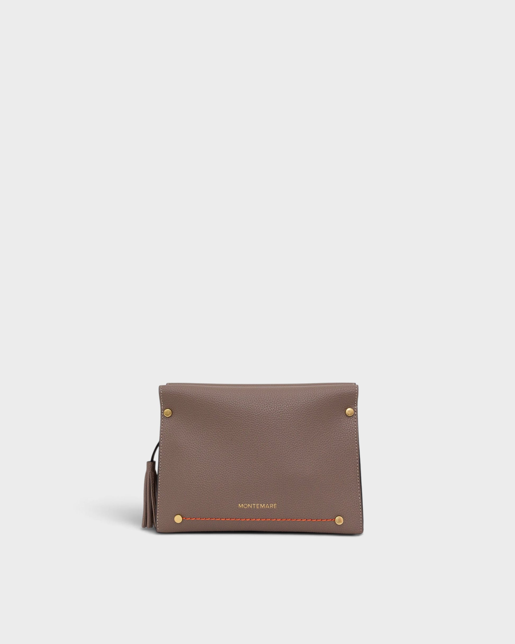Brown leather clutch bag with gold hardware on a white background