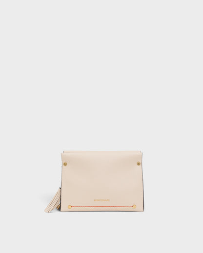 White clutch bag with tassel on a white background