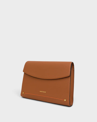 Brown leather laptop case with gold accents on a white background