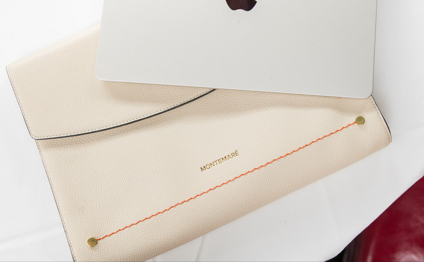 Montemare Vienna Laptop Case in Ivory on top of a white background