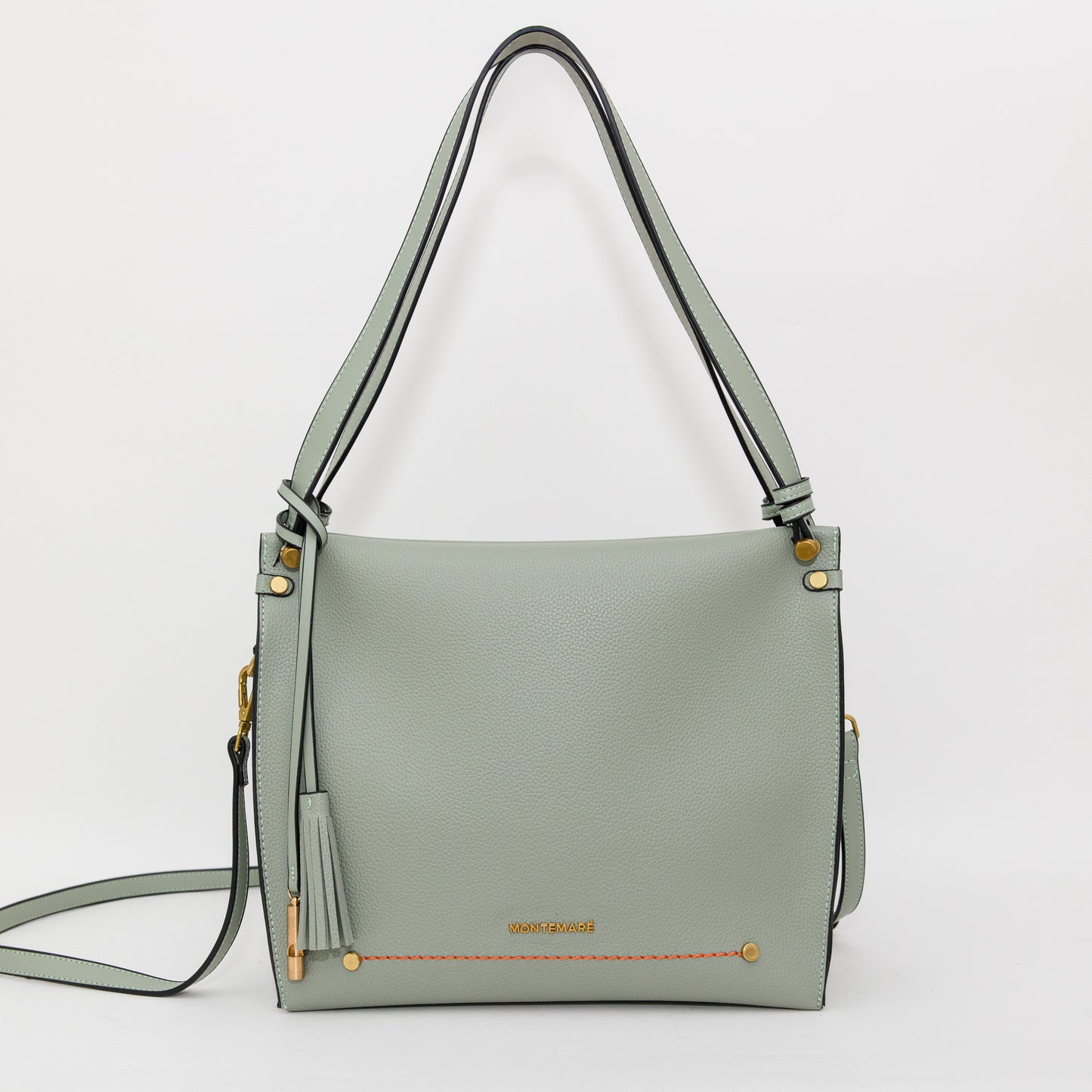 Light blue handbag with a strap on a white background
