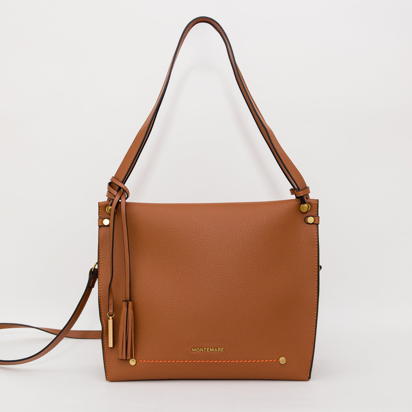 Brown leather handbag with gold accents on a white background