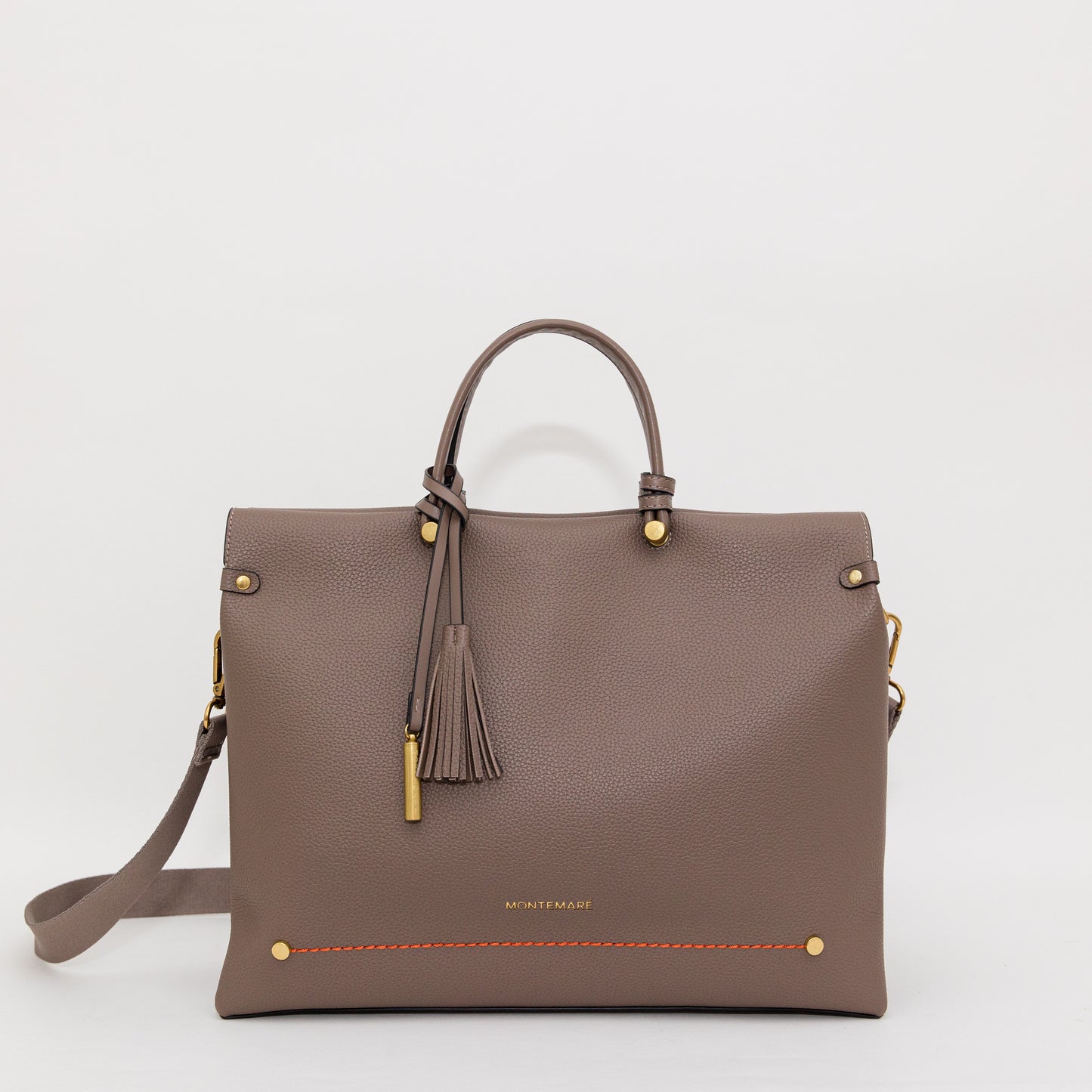 Brown handbag with gold accents on a light gray background