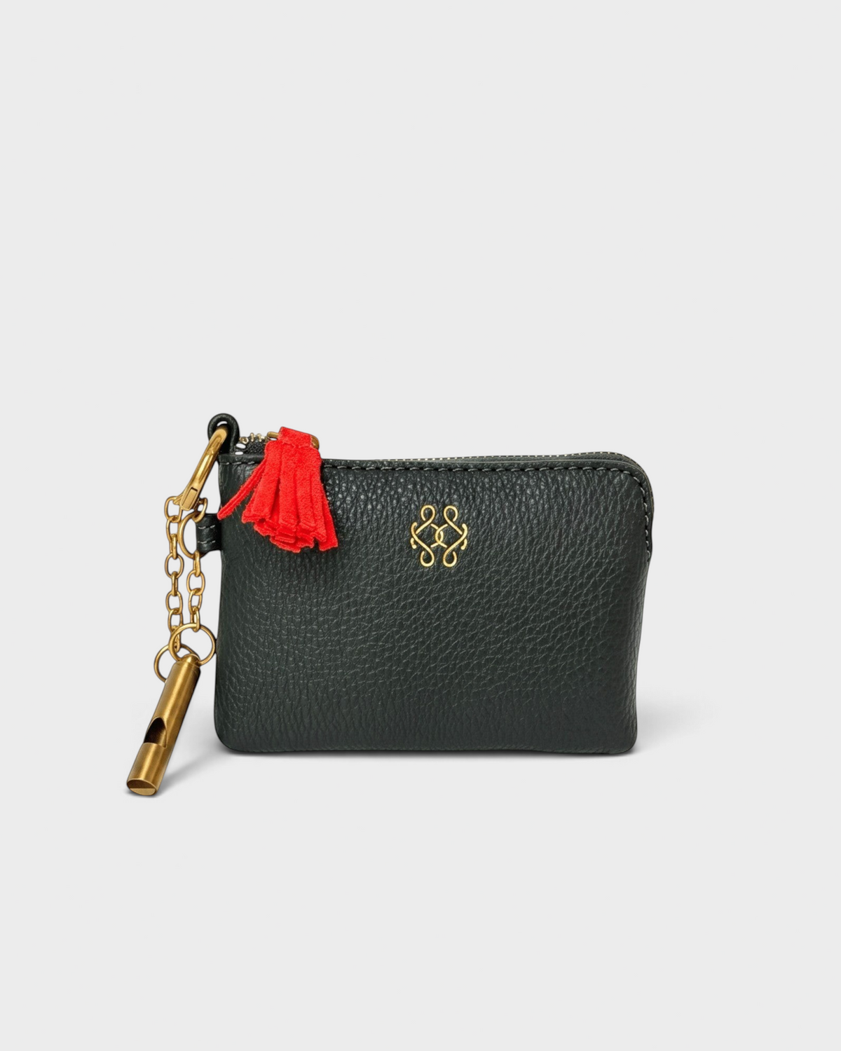 Montemaré black vegan leather RFID card case with gold keychain, zipper closure, and signature orange whistle tassel.