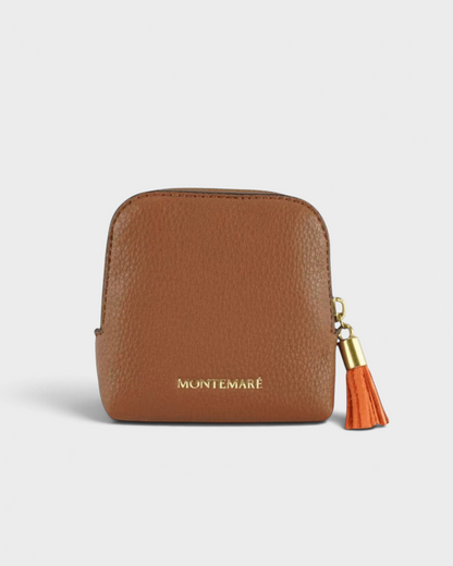 Montemaré small brown pebbled leather travel jewelry case with a gold zipper and matching leather tassel