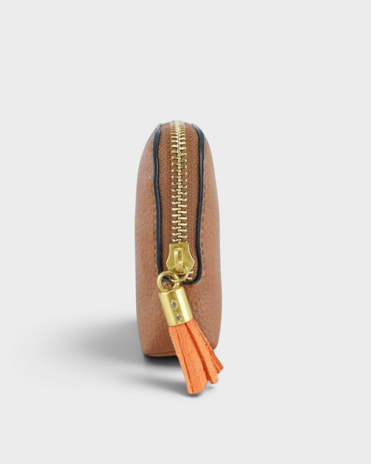 Montemaré small brown travel jewelry case with a gold zipper and orange tassel side view