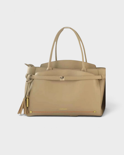 Montemaré Mayfair work tote in beige leather featuring a decorative tassel and gold-tone hardware details.