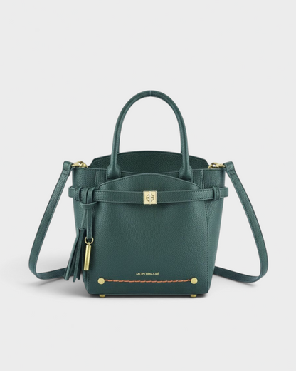 Montemaré Mayfair tall crossbody bag in forest green textured leather with gold hardware and a decorative tassel.