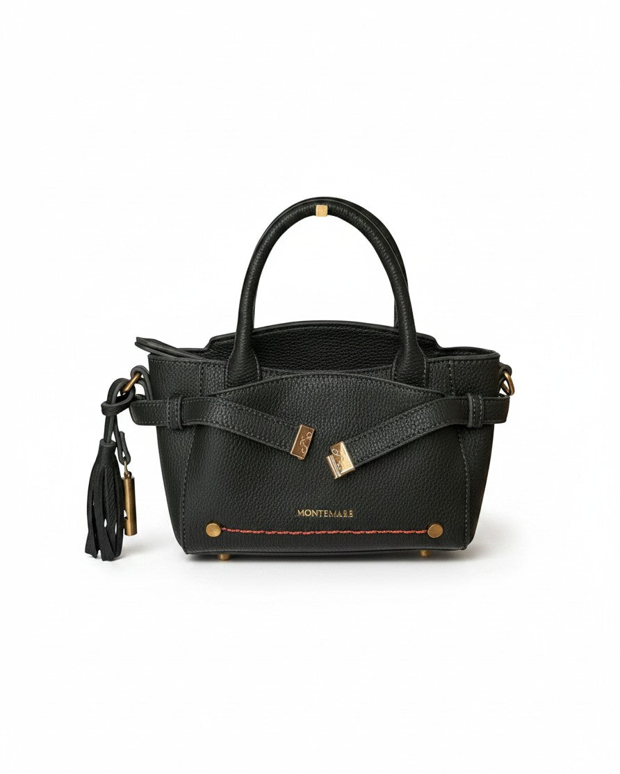 Montemaré Mayfair Mini Crossbody bag in black pebbled leather with gold hardware and a decorative tassel.