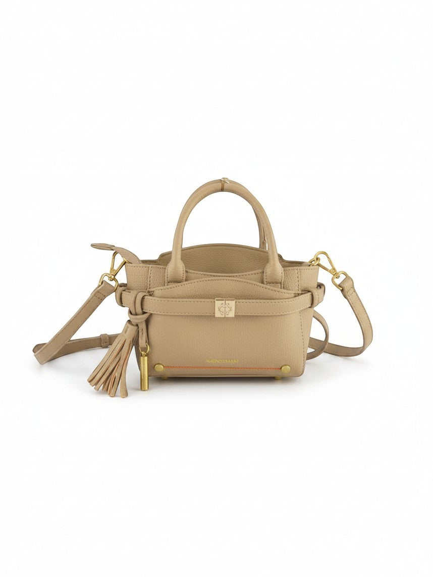 Montemaré Mayfair Mini Crossbody bag in beige pebbled leather with gold hardware, tassel detail, and top handles.