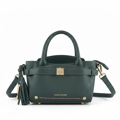 Montemaré Mayfair Mini Crossbody bag in dark green pebbled leather with gold hardware and a decorative tassel.