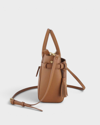 Montemaré Mayfair Tall Crossbody bag in tan pebbled leather with side tassel detail and adjustable shoulder strap