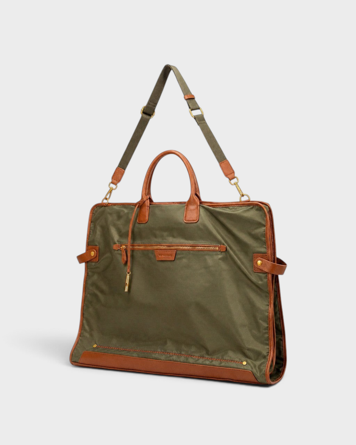 Montemaré olive green waterproof nylon tri-fold garment bag with brown leather trim, top handle, and shoulder strap.