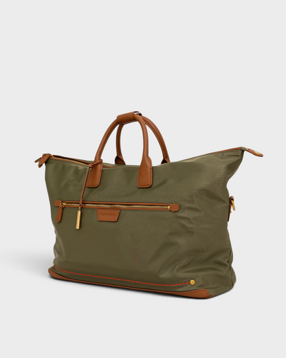 Montemaré olive green waterproof nylon weekender bag with tan leather handles and gold hardware on white background