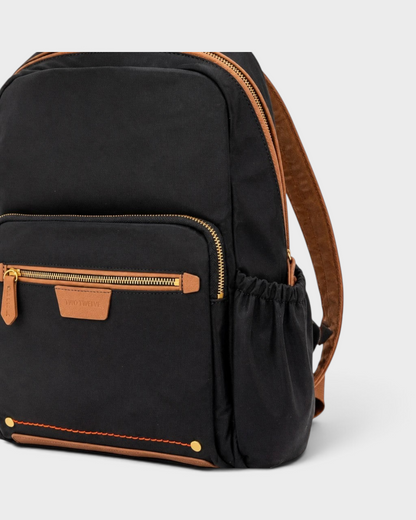 Montemaré Oslo black nylon and brown leather backpack with gold zippers and side water bottle pockets