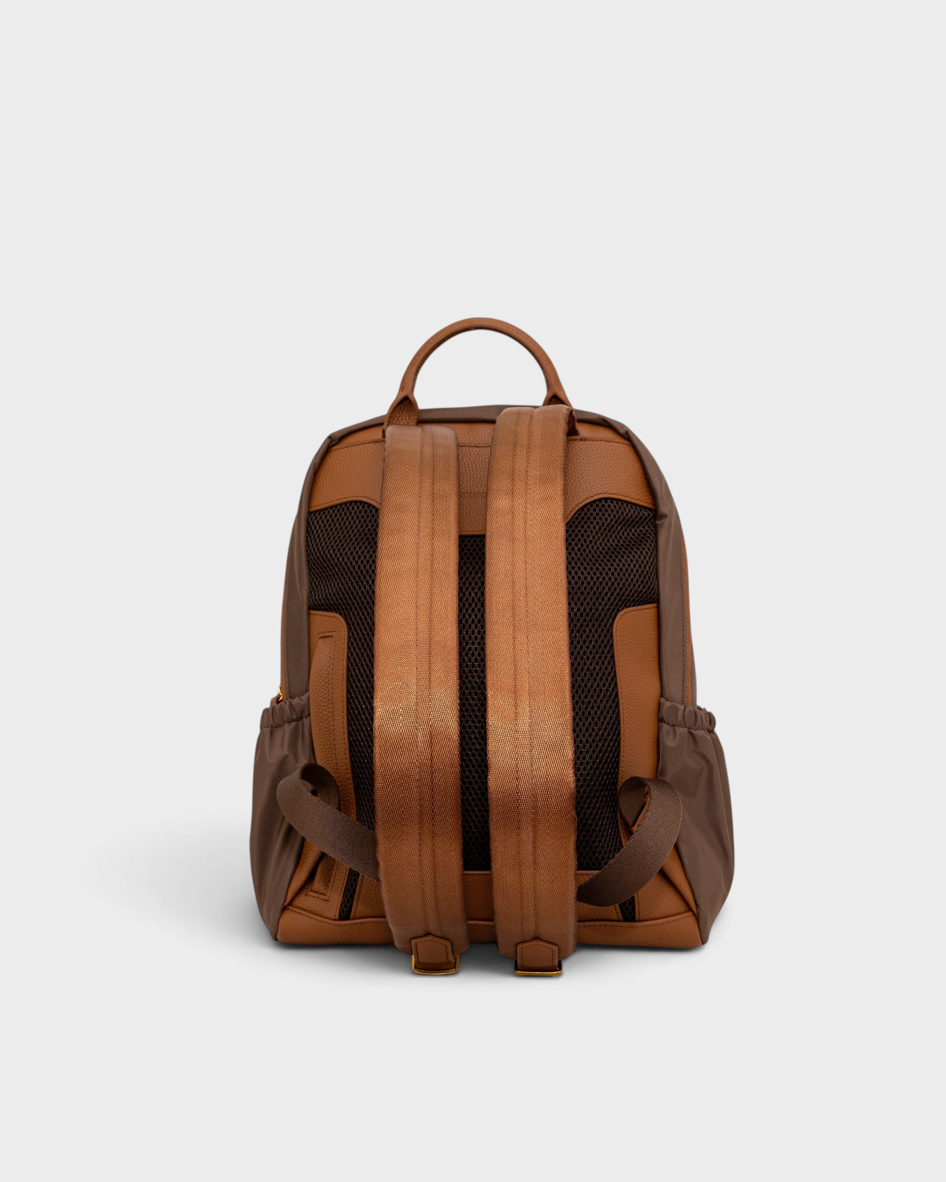 Back view of Montemaré Oslo brown nylon and leather backpack with adjustable straps and mesh back padding