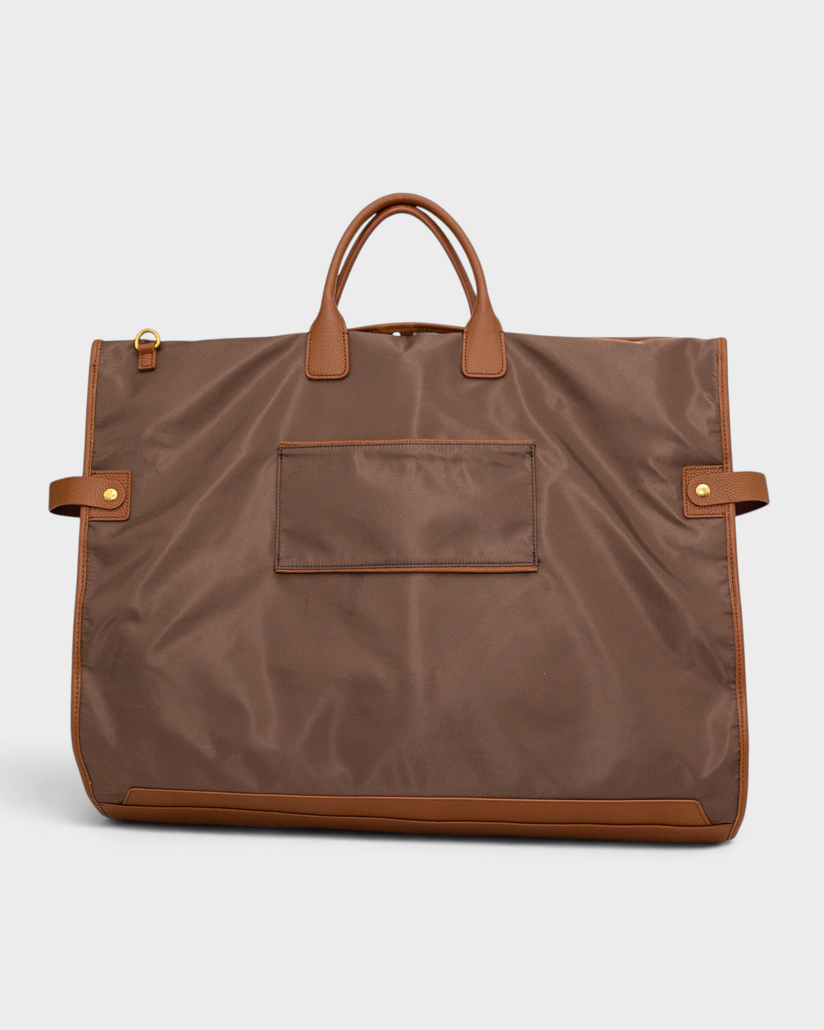 Montemaré Oslo premium brown waterproof nylon garment bag with genuine leather trim and top handles.