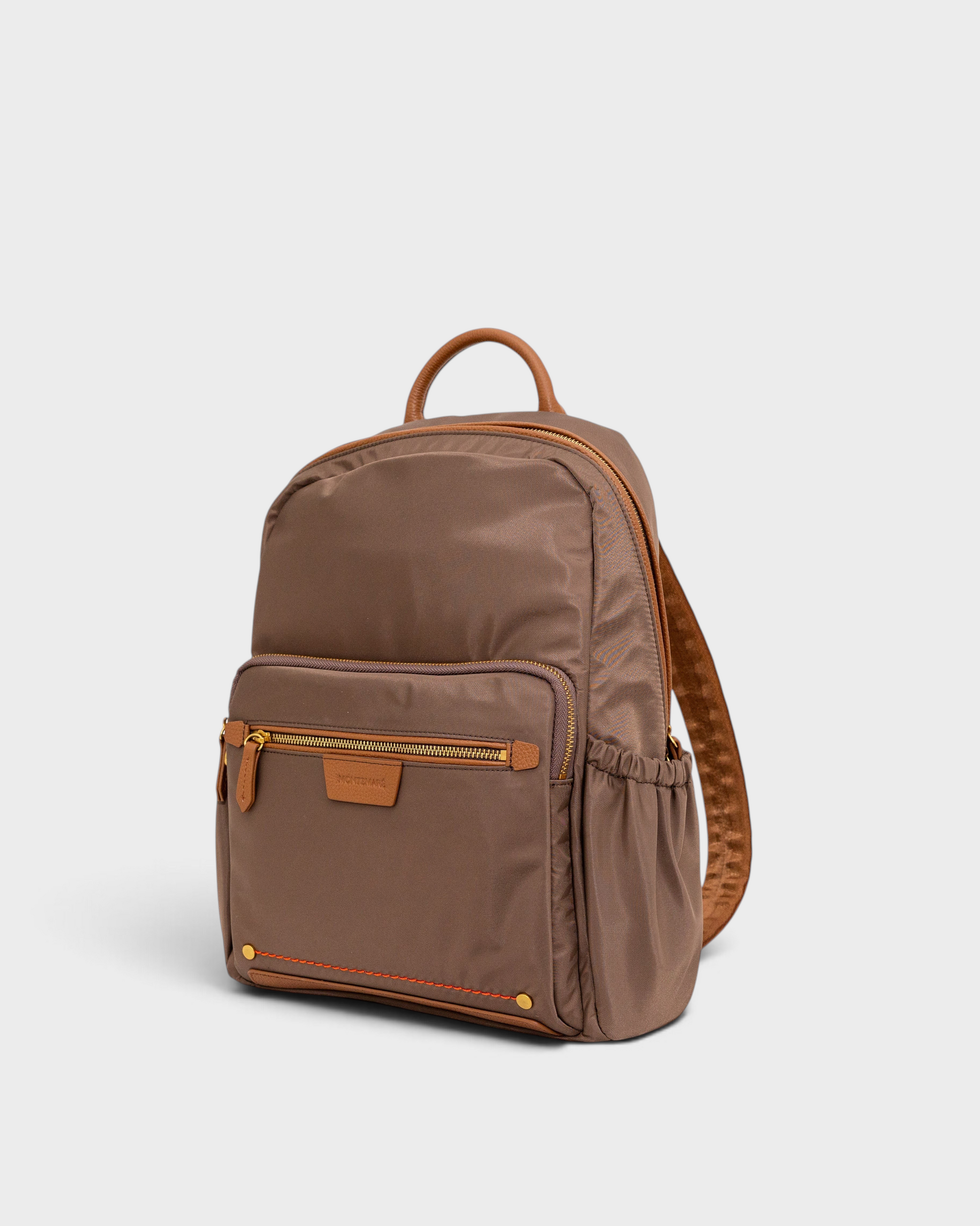 Montemaré Oslo premium brown nylon and leather travel backpack with RFID-blocking pockets and top carry handle.
