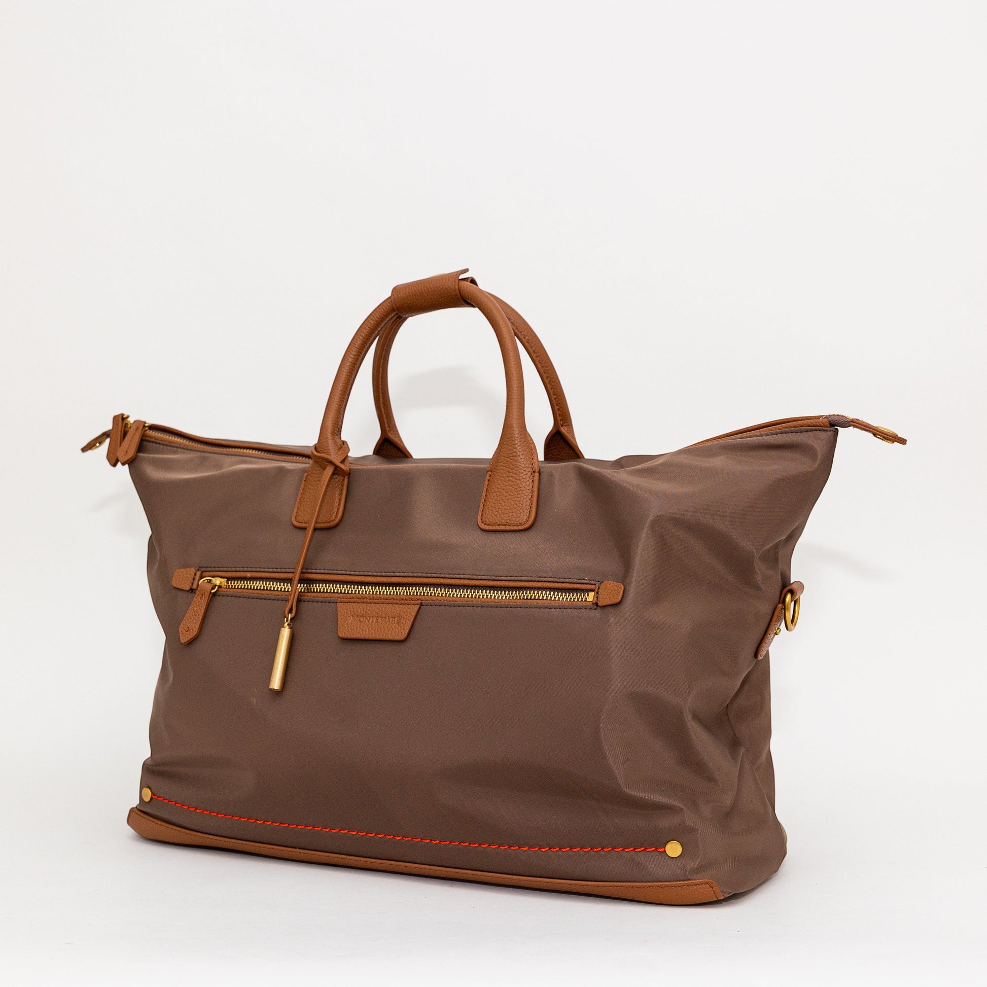 Montemaré Oslo Carry On weekender bag in brown waterproof nylon with genuine leather trim and gold hardware