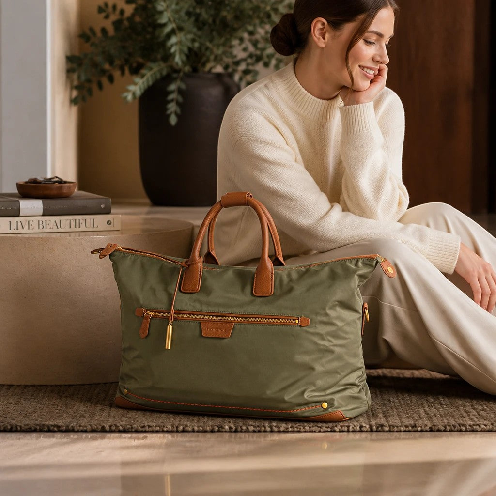 Montemaré Oslo Carry On weekender bag in olive green waterproof nylon with tan leather trim and gold hardware