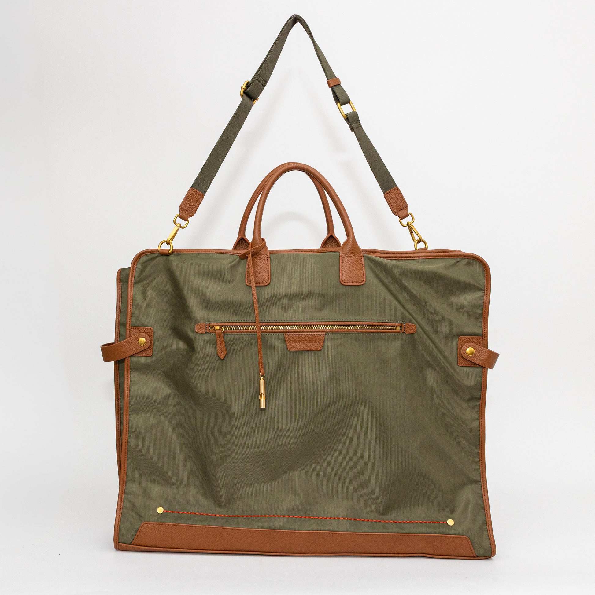 Green and brown bag with a strap on a white background